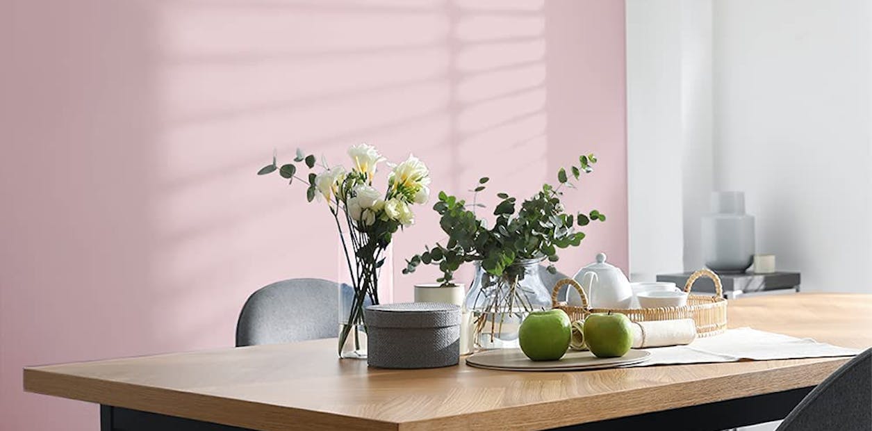 Pink interior walls create a warm ambience.