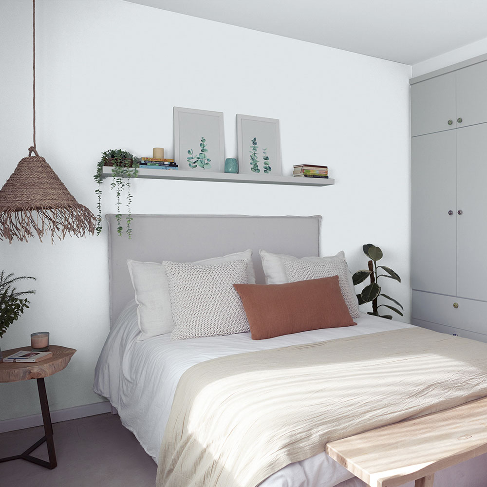 Bedroom painted with a light grey paint