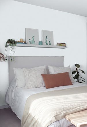 Bedroom painted with a light grey paint
