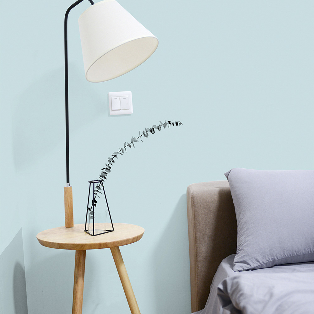 Bedroom painted pale blue 