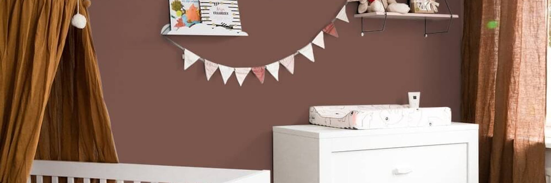 Bedroom painted with a warm red paint colour