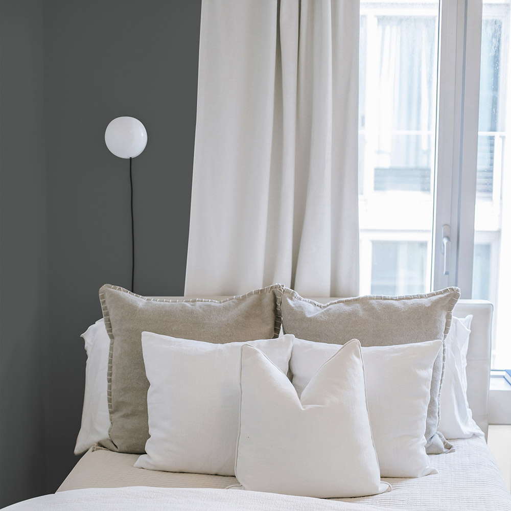 Bedroom painted with a darker grey shade