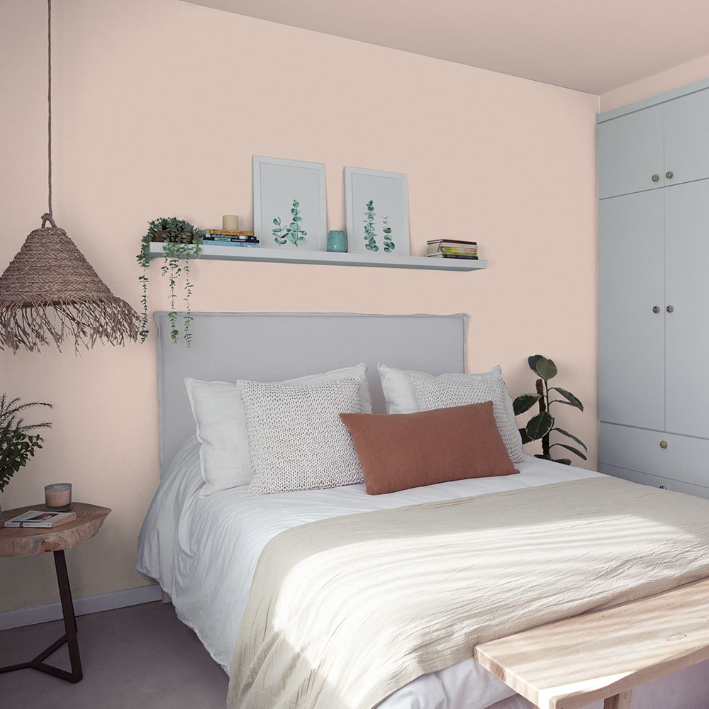 Orange bedroom wall painted with Enchanted Desert