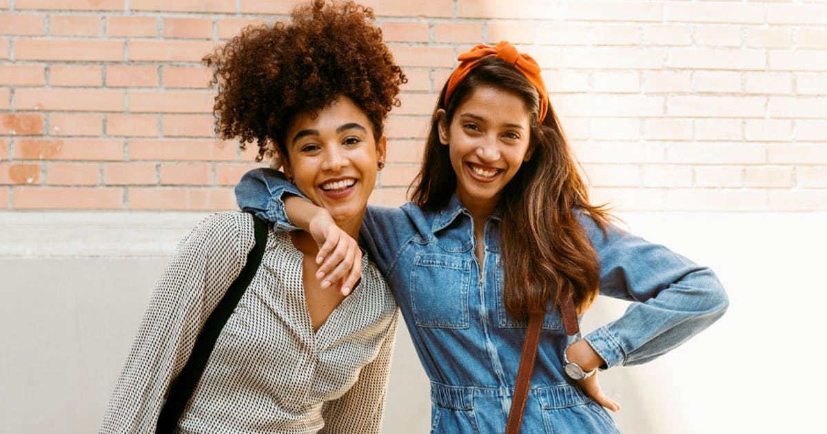 Two young women smiling