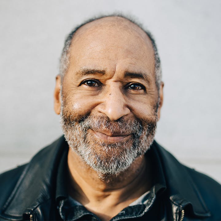 man in leather jacket with beard