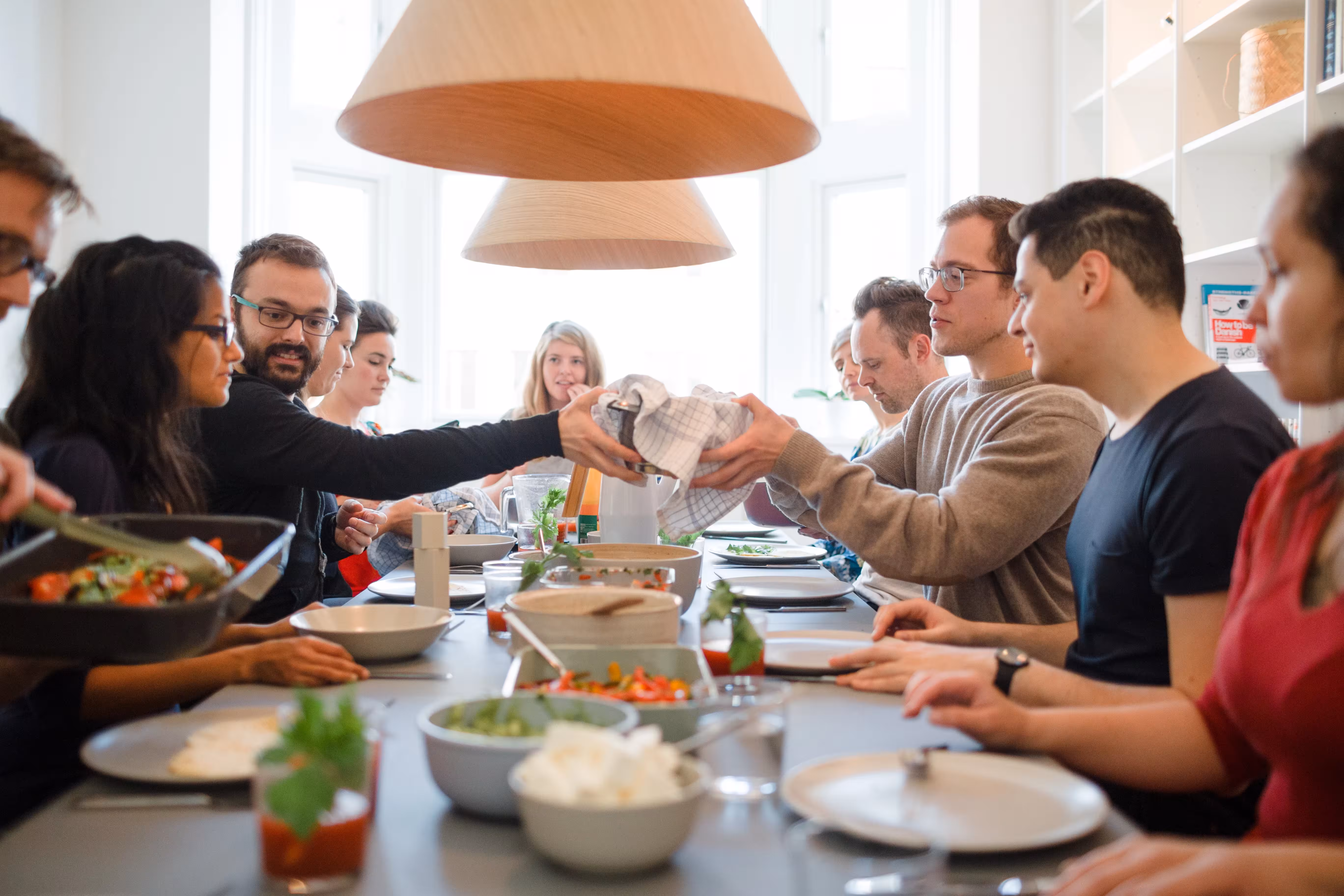 Community dinner in a LifeX coliving apartment