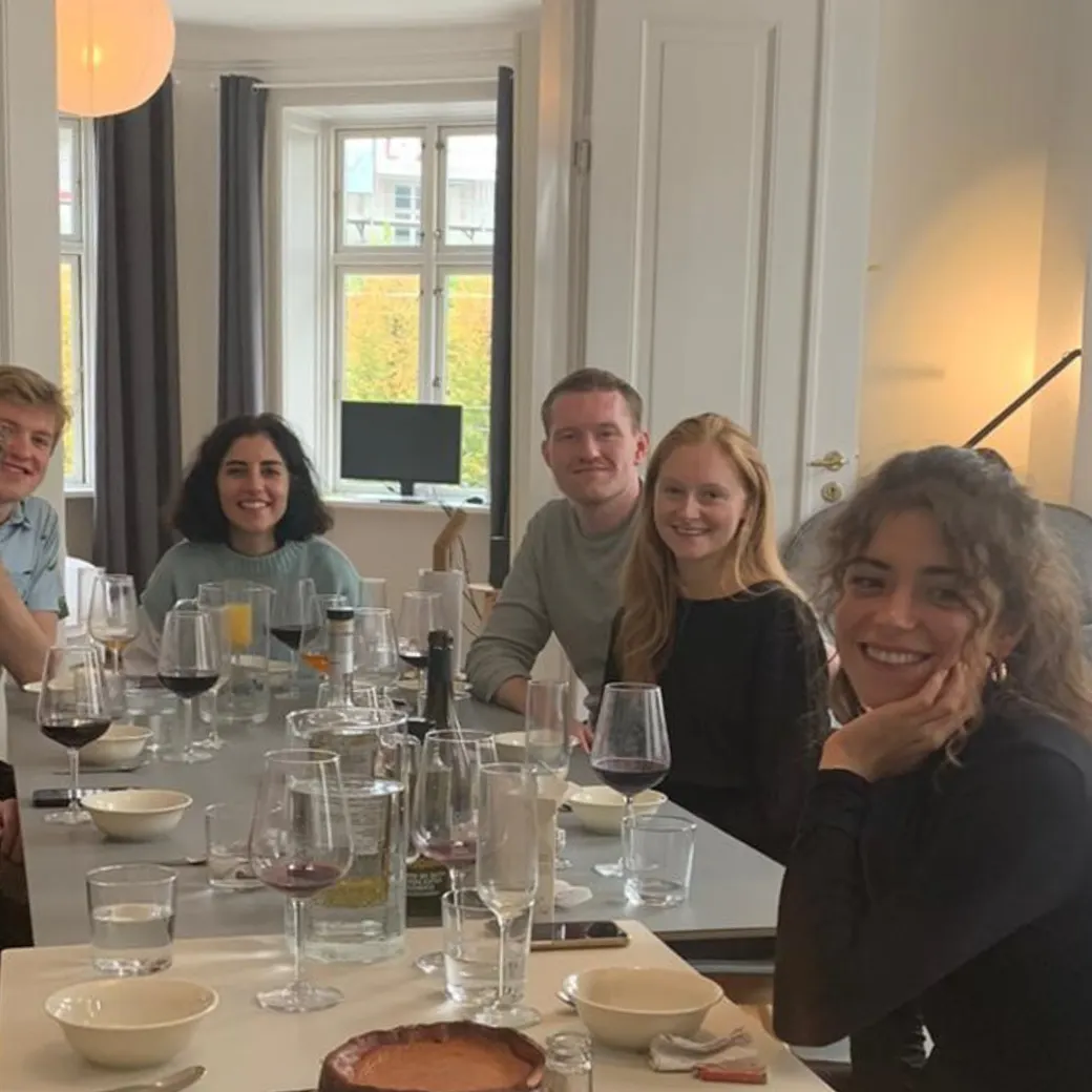 Shared dinner in a LifeX coliving apartment in Copenhagen