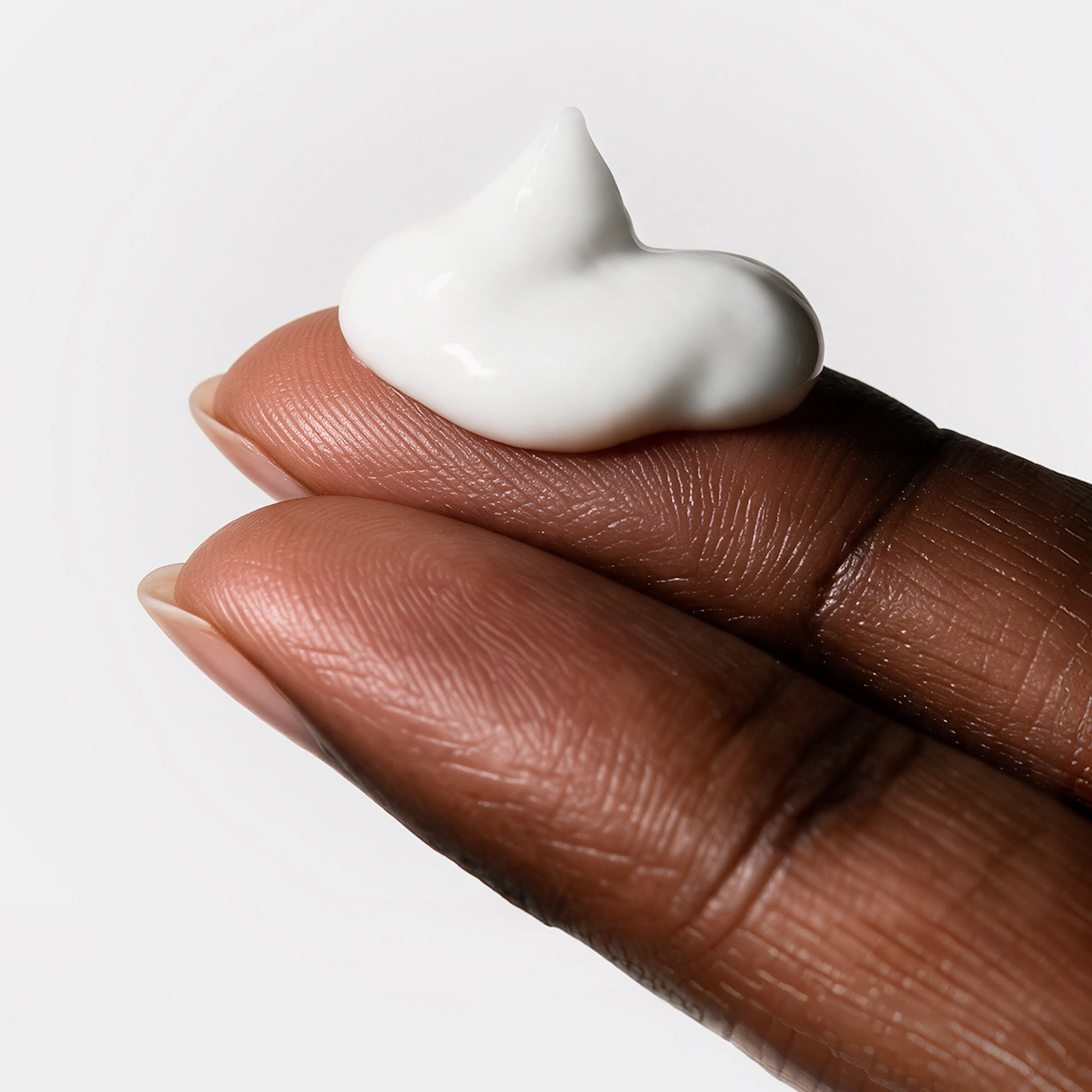 hand with vaginal estrogen serum