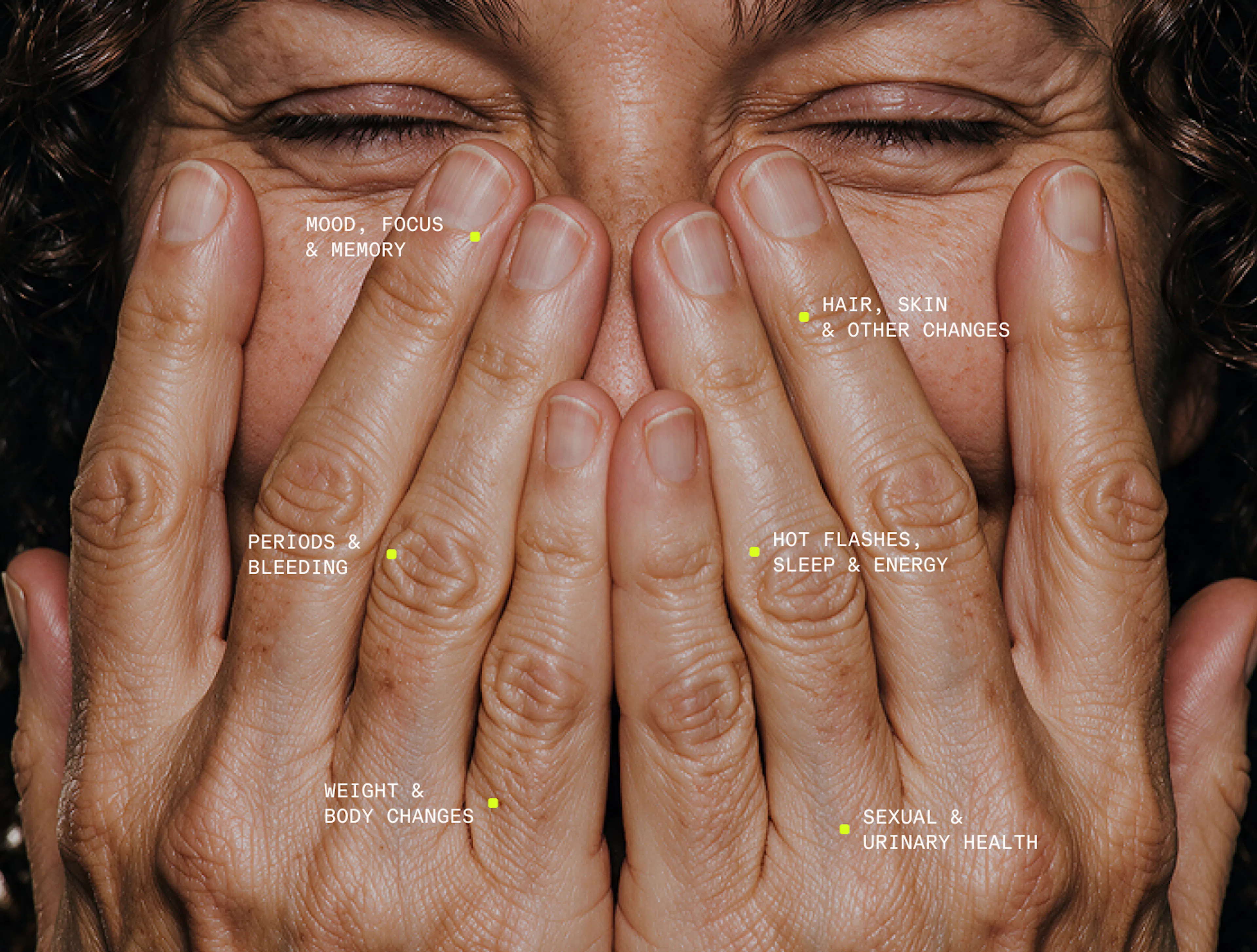 Woman covering face with both hands