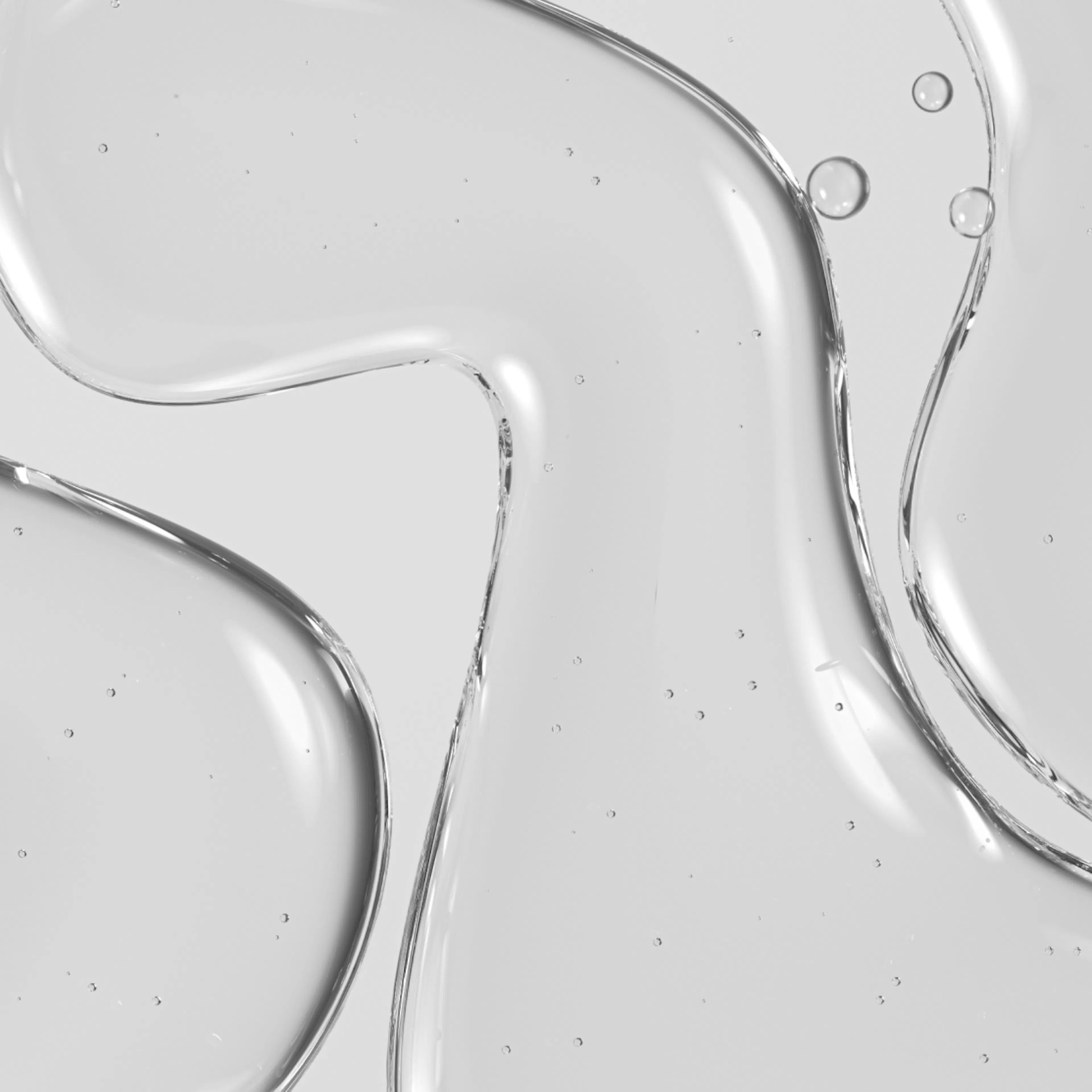 A close-up artsy photo of a clear Divigel substance.