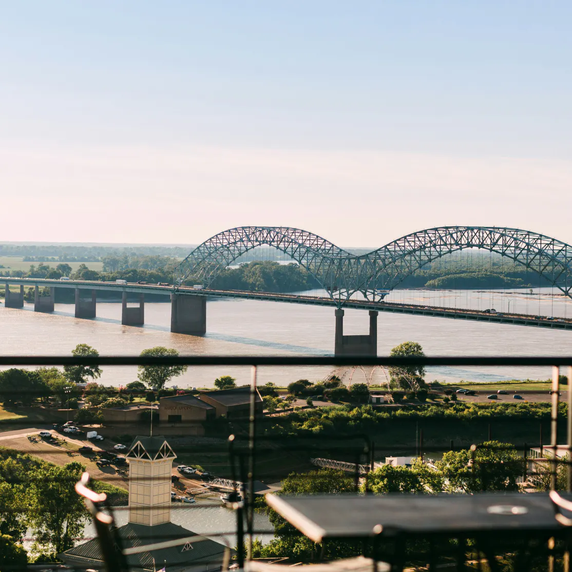 Downtown Memphis showing bridge with arches over Riber