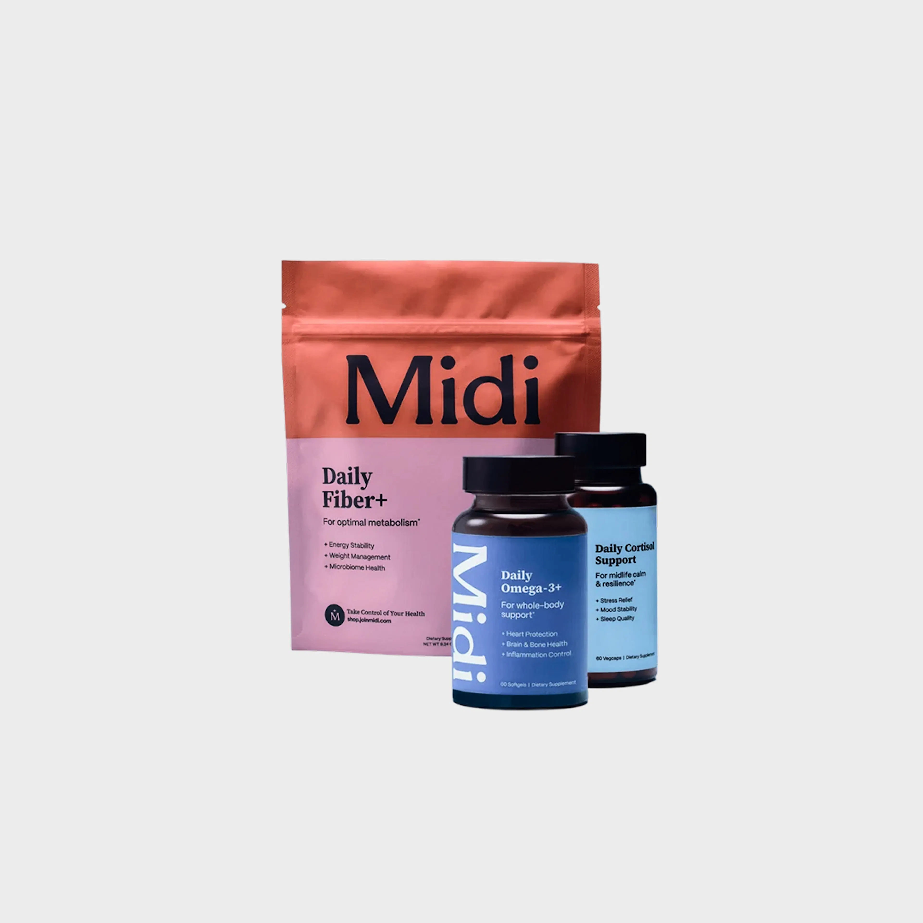 Bundle of products including a bag of daily fiber+ gummies, a bottle of omega-3+ capsules and a bottle of daily cortisol support. 