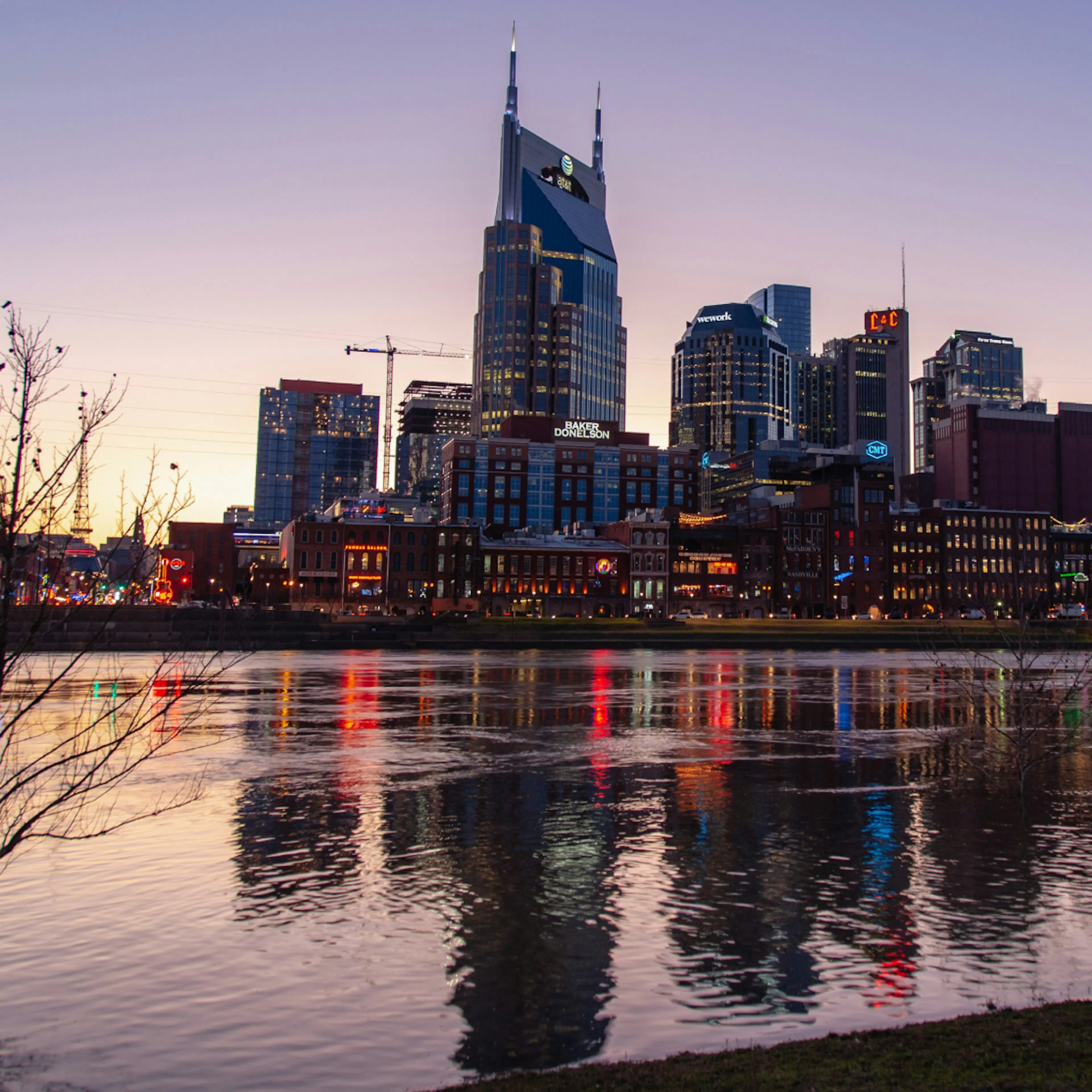 A photo of the Nashville skyline at dusk.