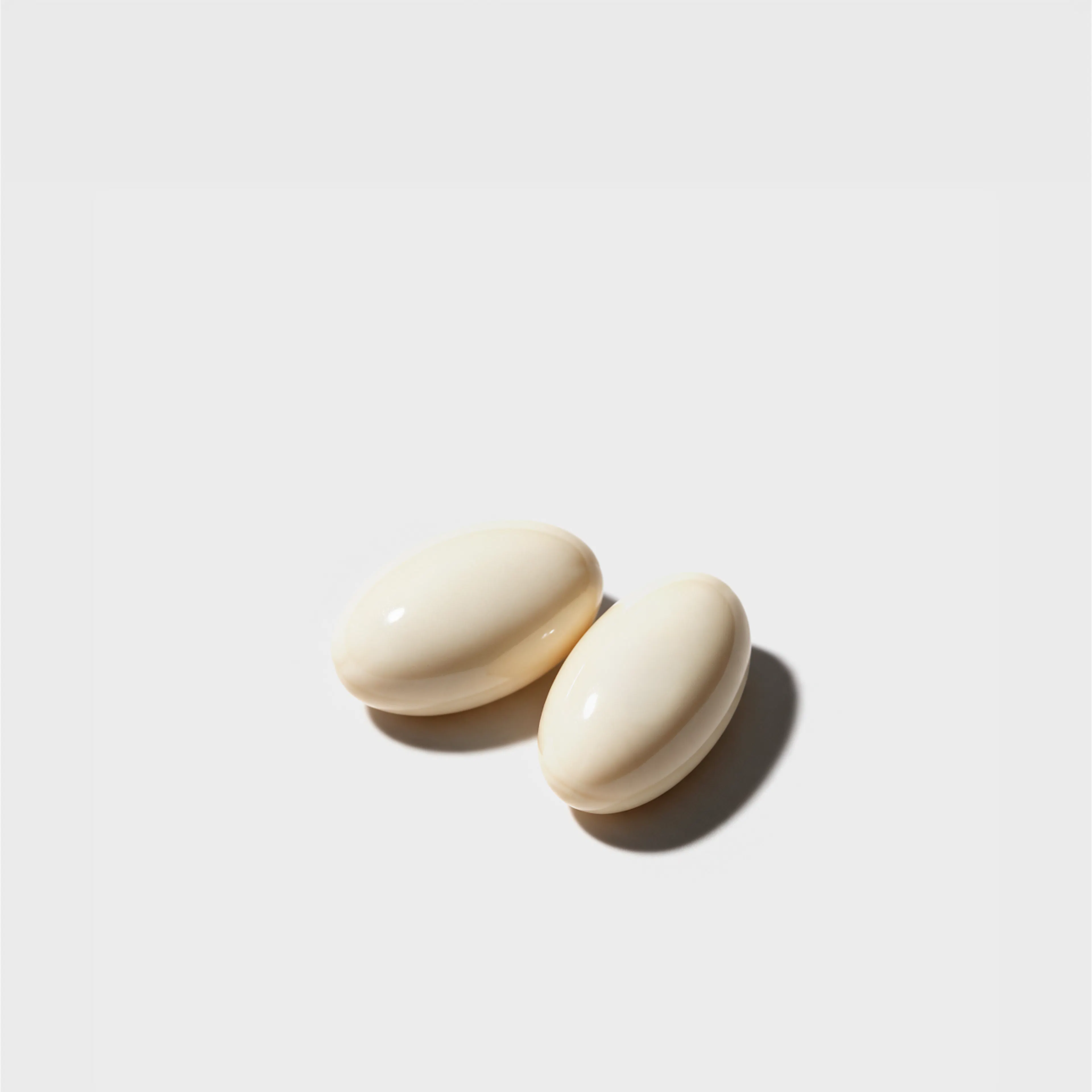 Two smooth cream Progesterone supplement capsules