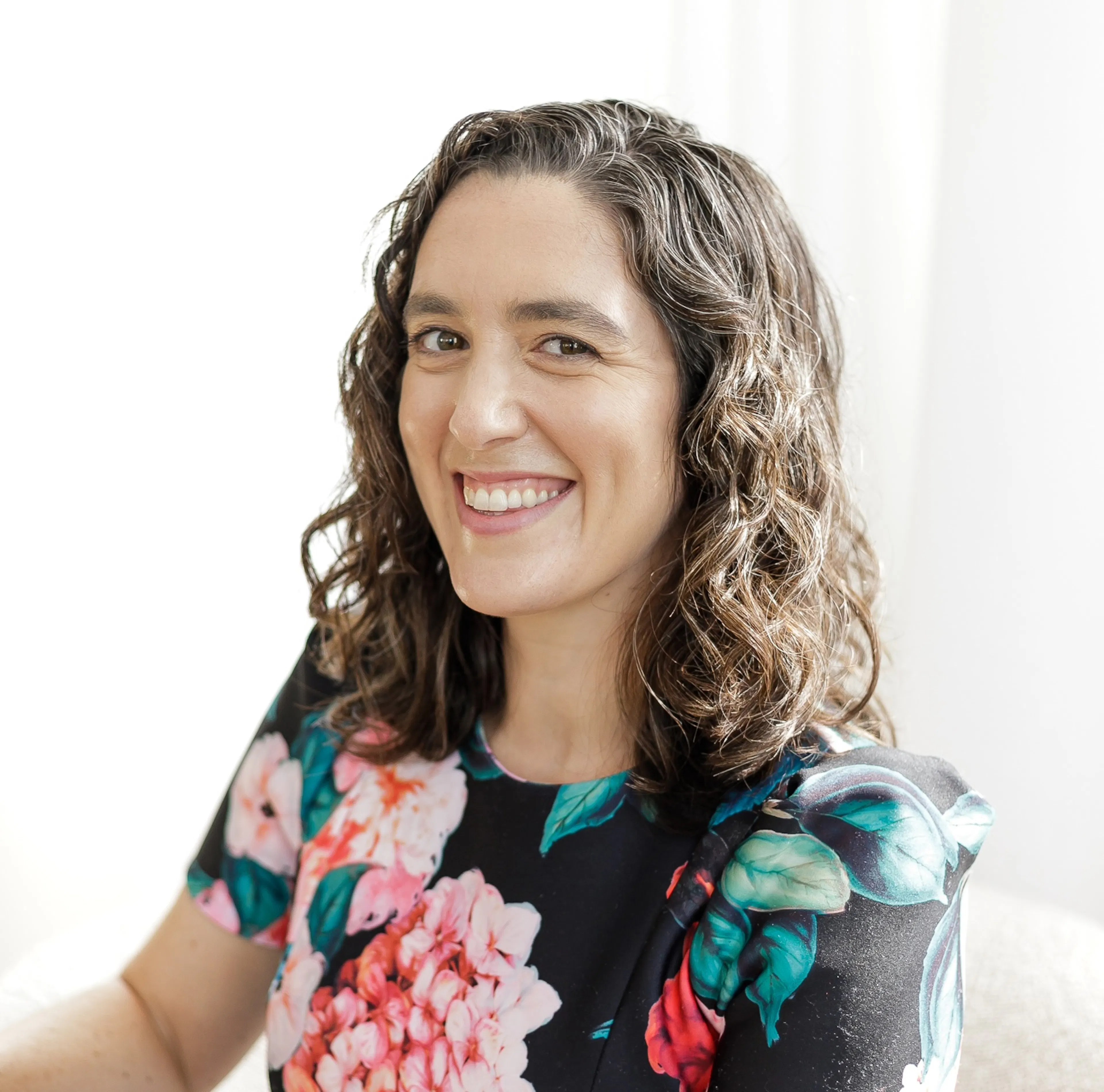 Headshot of Sarah Klein, a writer for Midi
