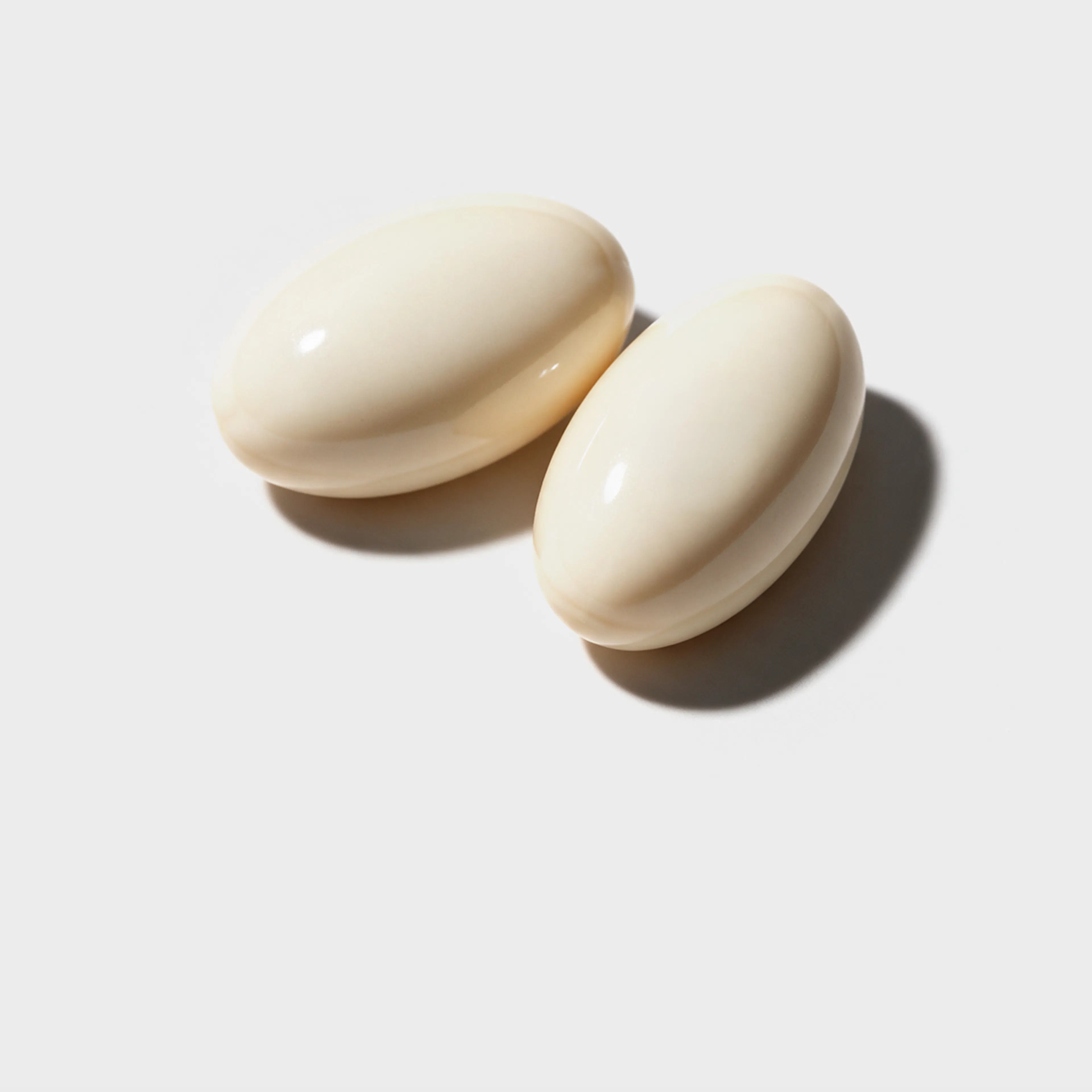 Two smooth cream Progesterone supplement capsules