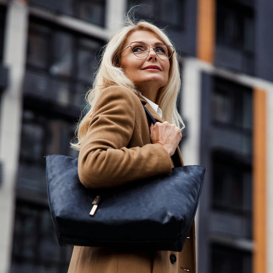 A woman in menopause walking outside.