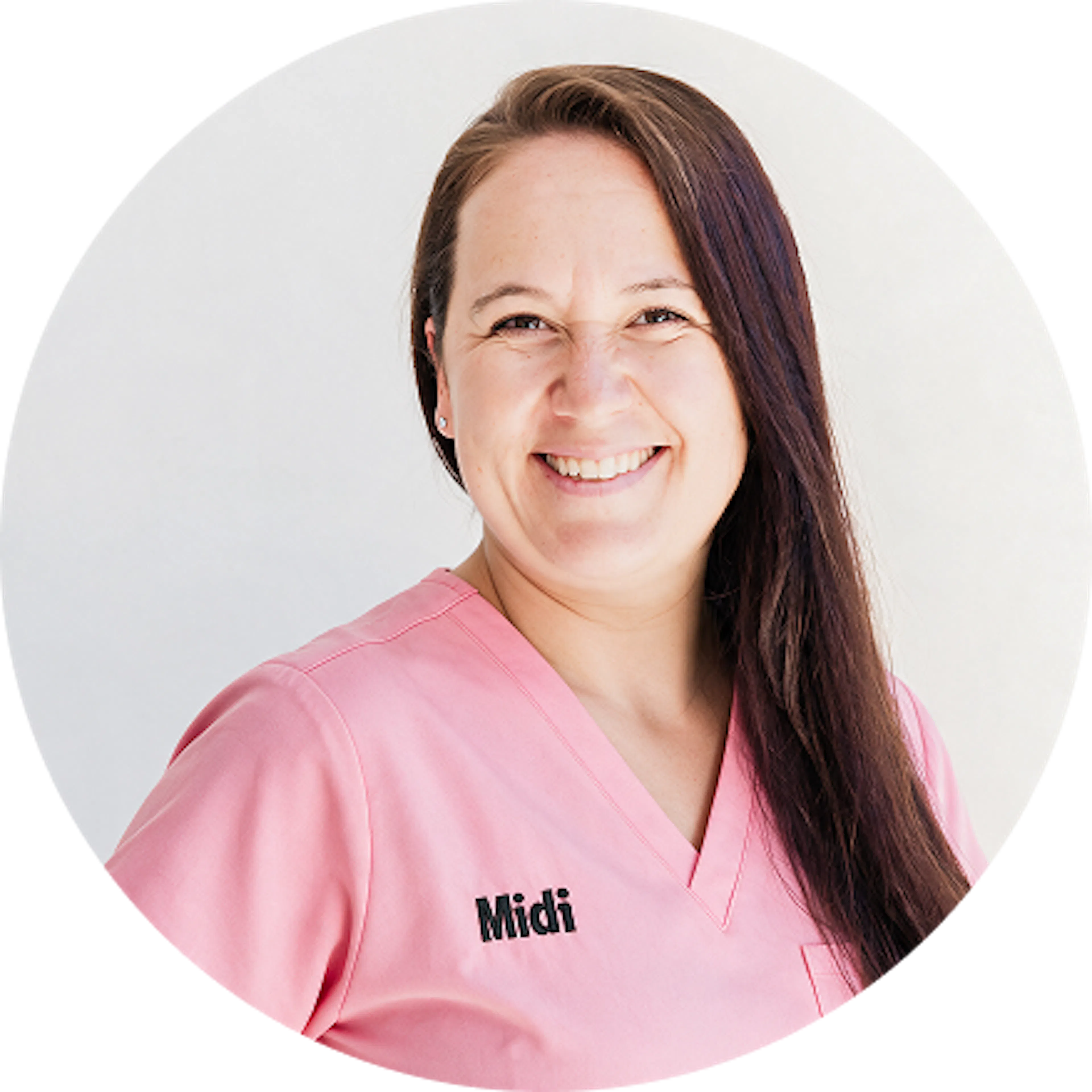 Medical professional in pink scrubs