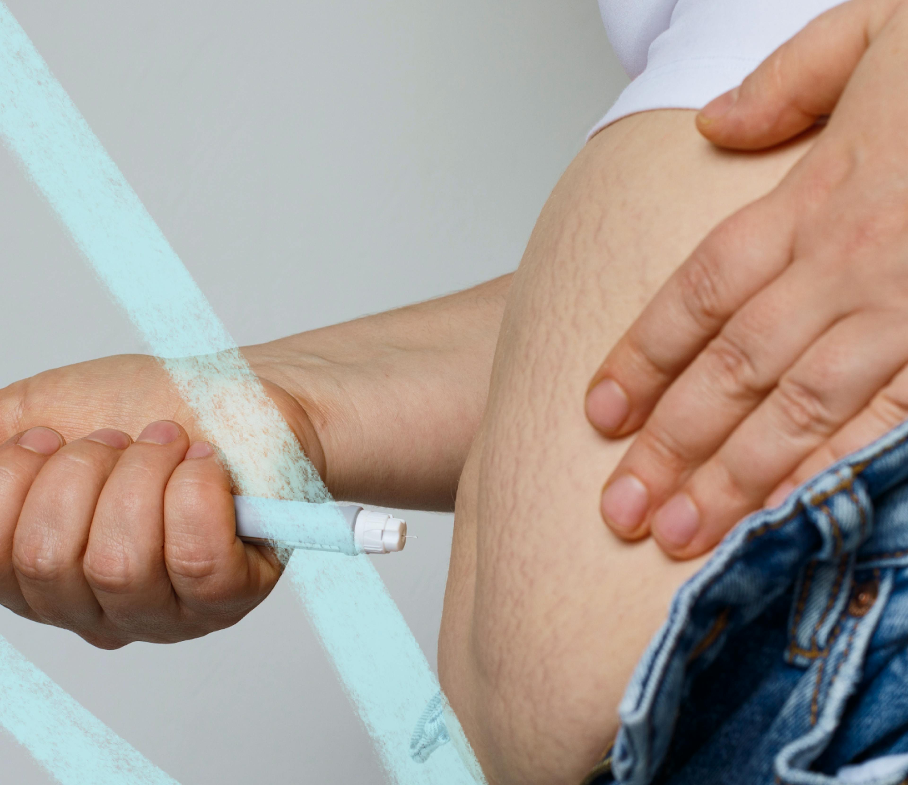 person injecting their belly with medication