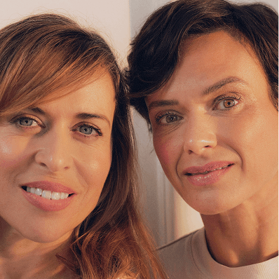 Portrait of two women smiling