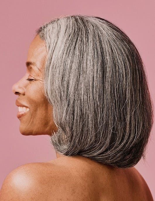 Photograph of middle aged woman smiling