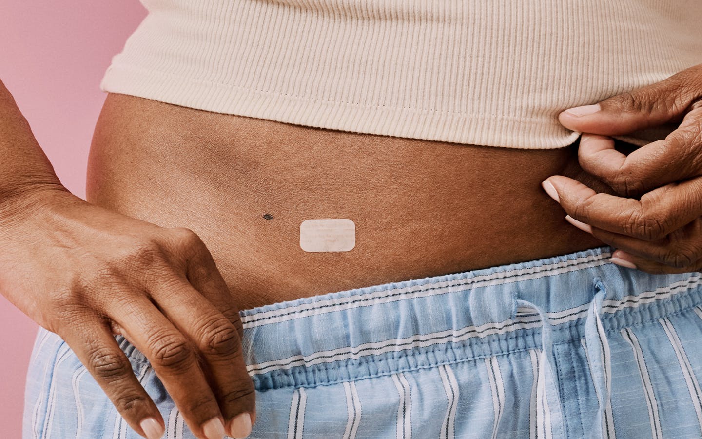 Photograph of woman with hrt patch
