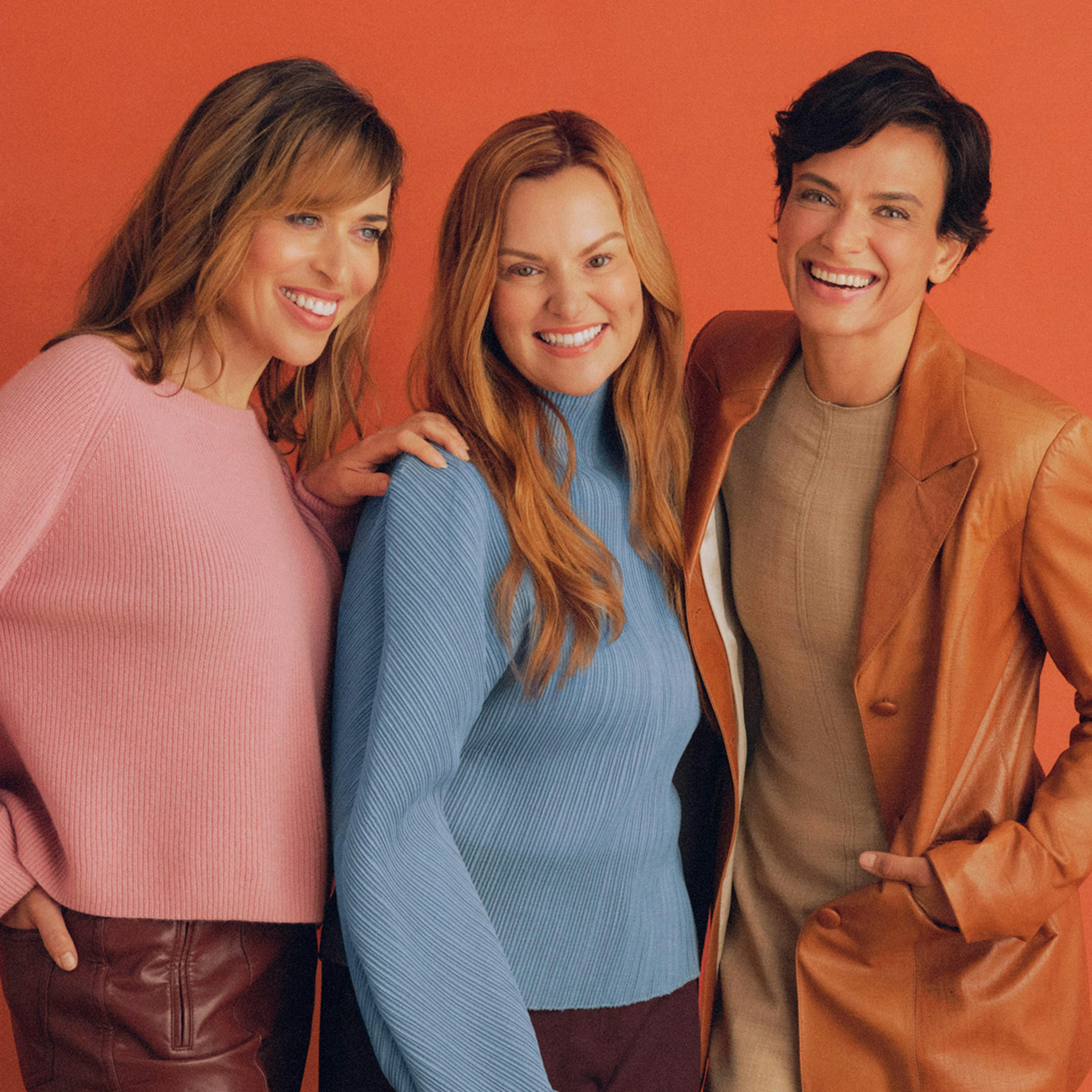 Photograph of three Midi patients smiling together