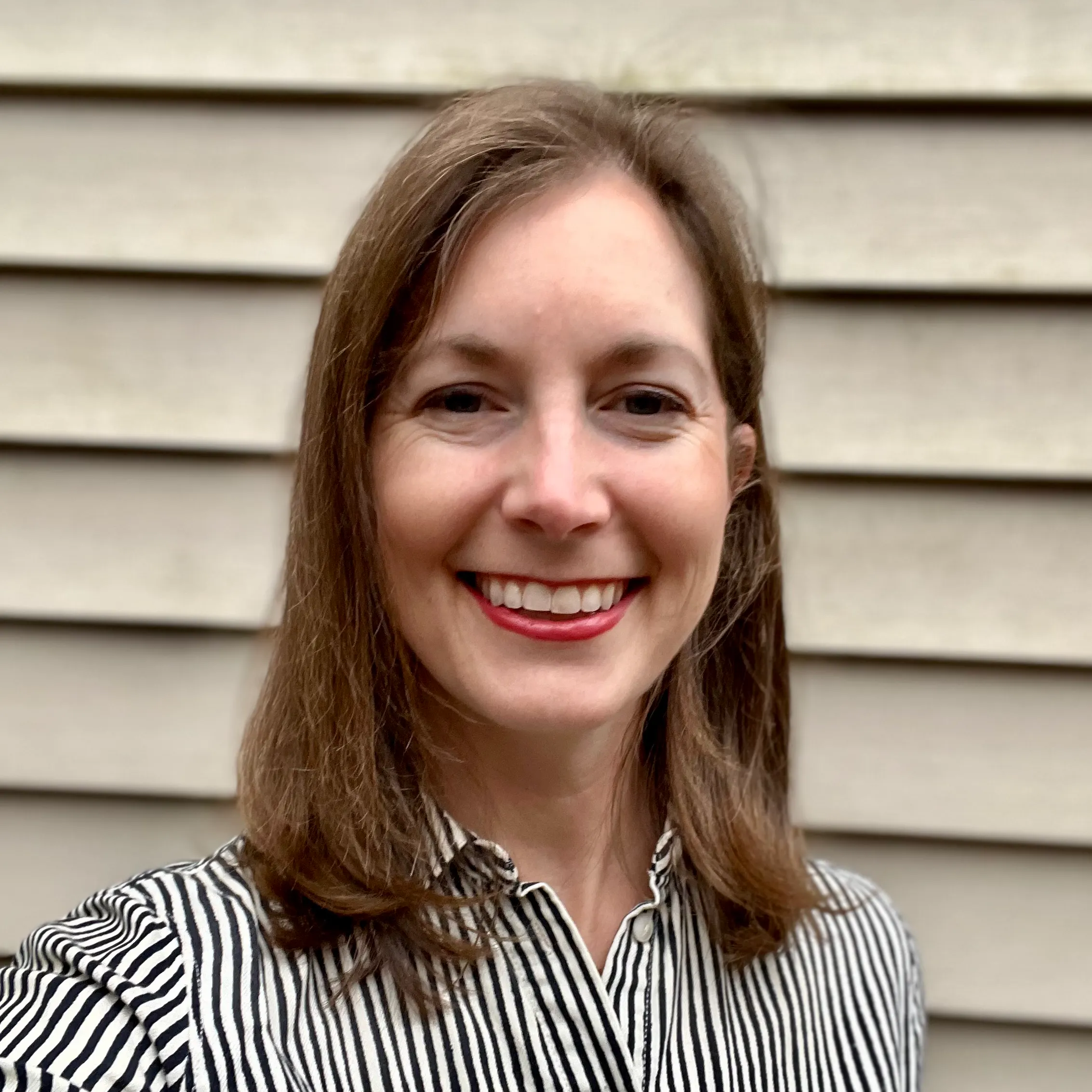 A headshot of Jennifer Heimlich, a writer for Midi