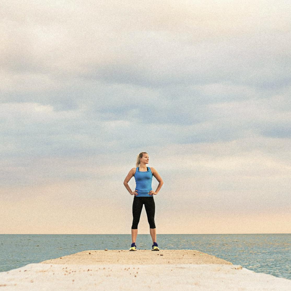 Woman standing feet shoulder width apart