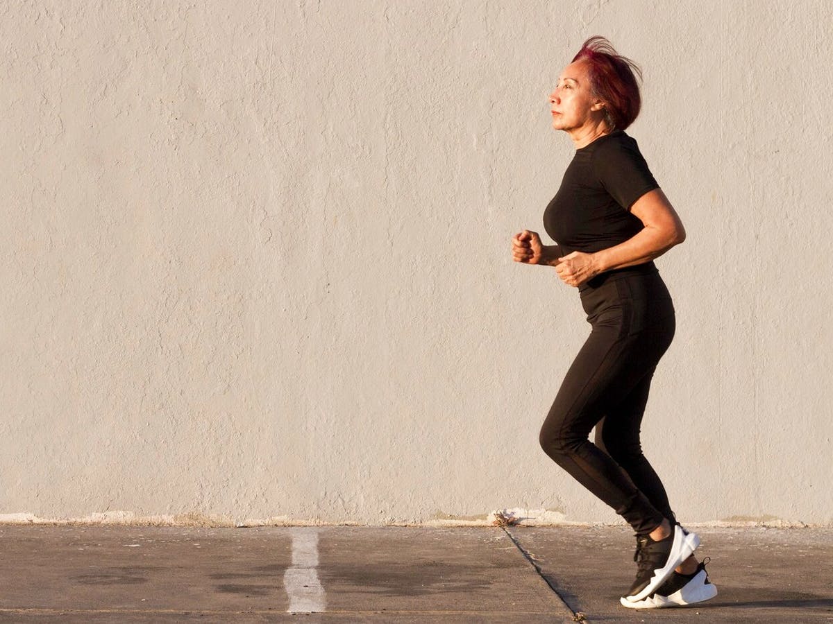 Middle aged woman running