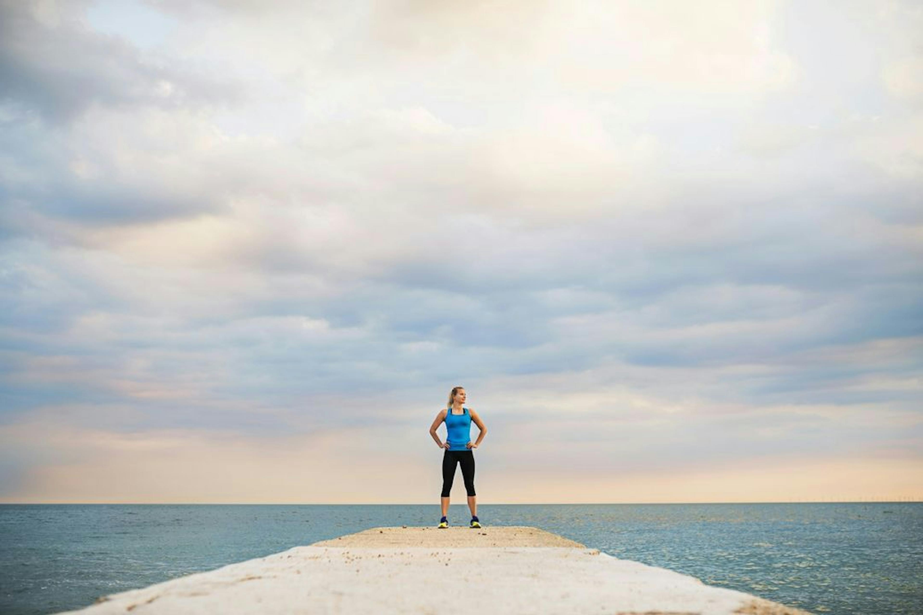 woman standing feet shoulder width apart