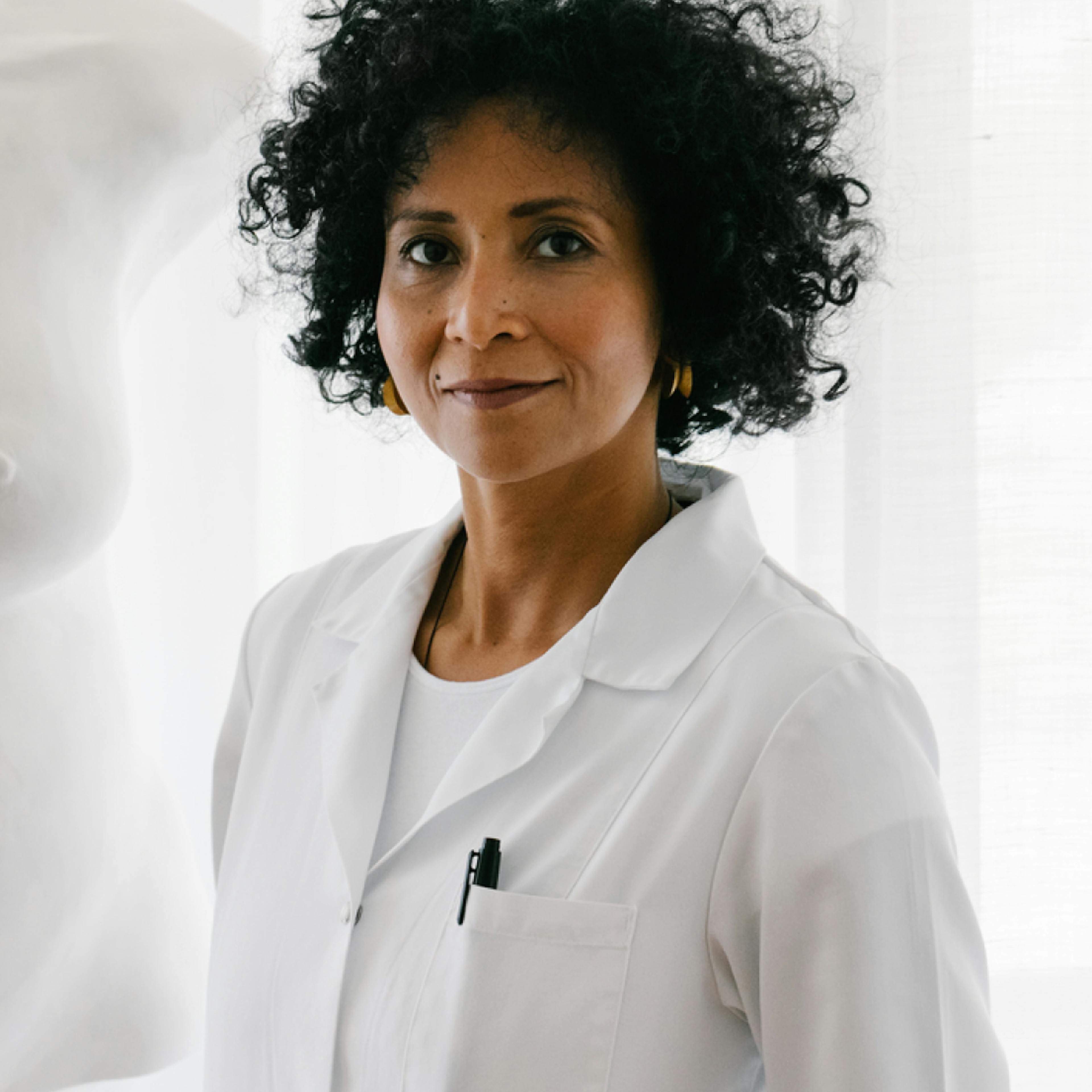 woman doctor in lab coat