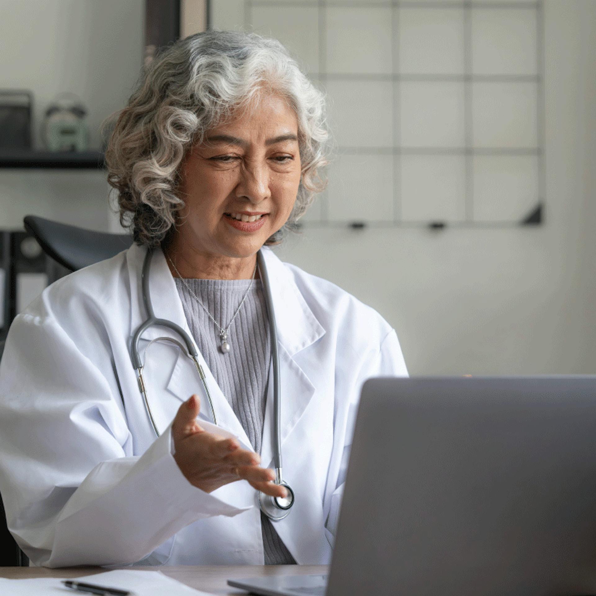 clinician using laptop