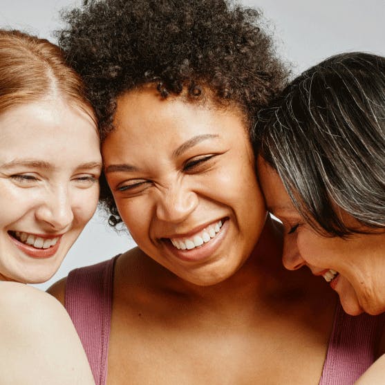 A group of women in midlife hugging