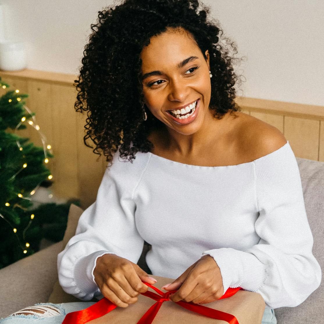 woman opening a present