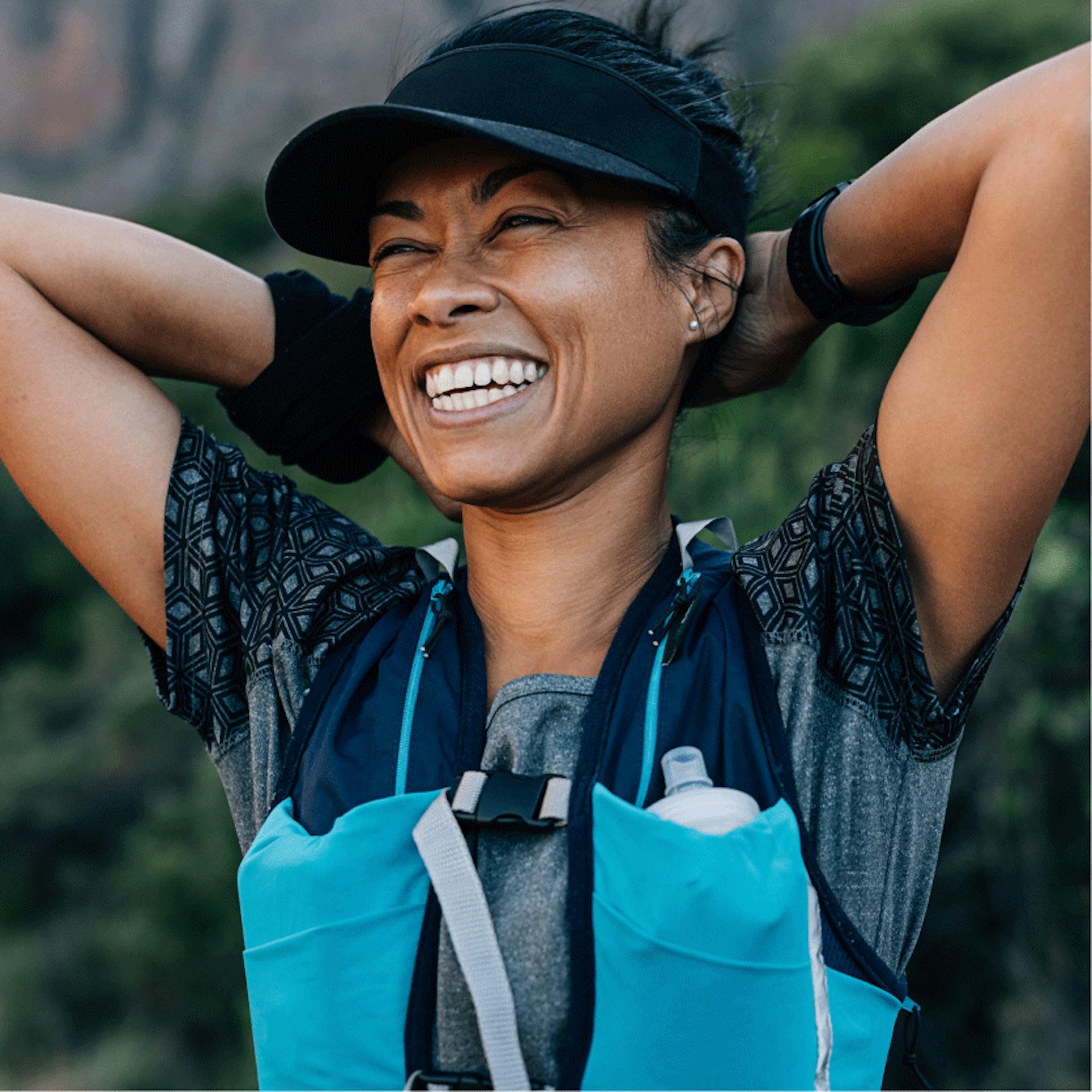 woman in menopause walking with a weight vest