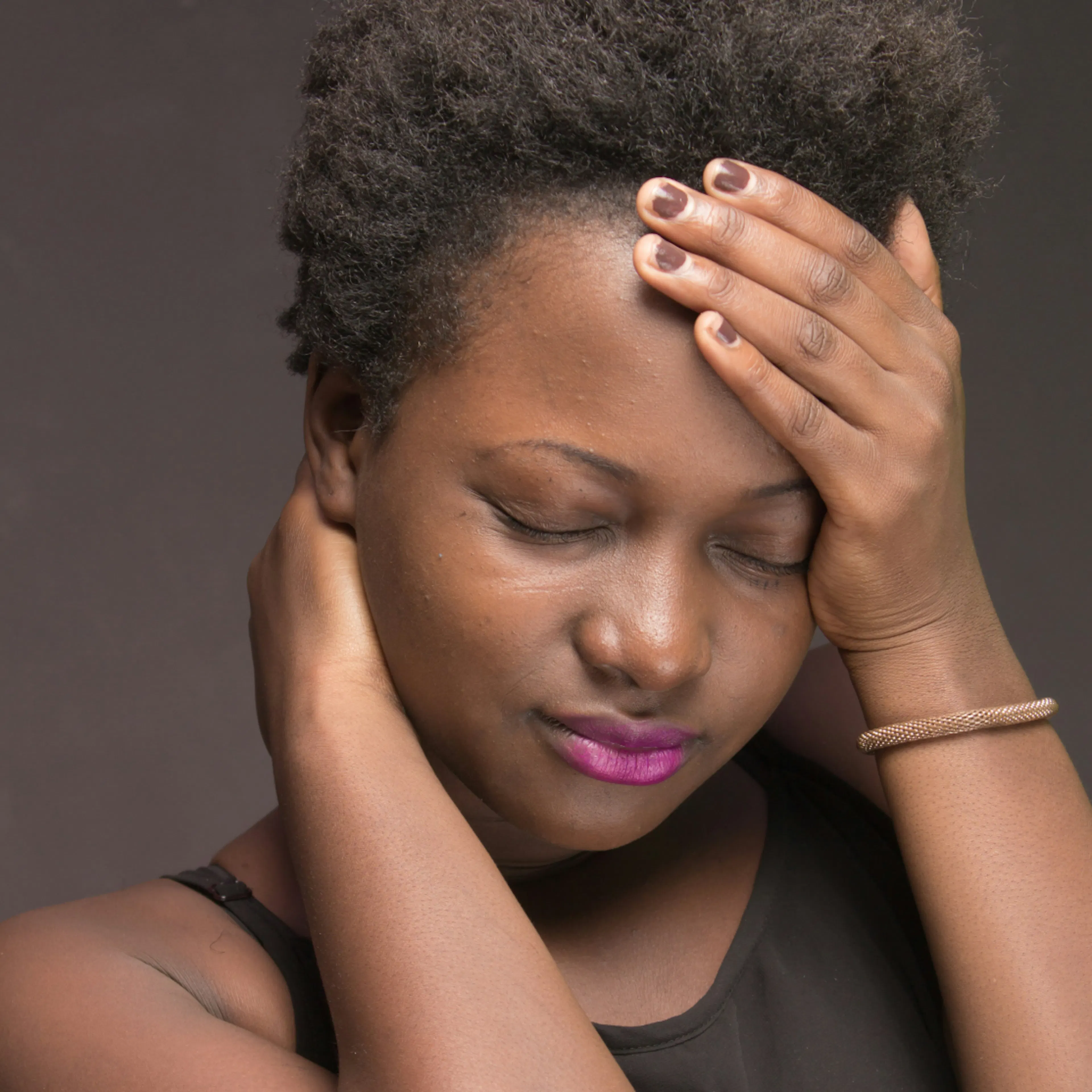 A woman experiencing dizziness during menopause.