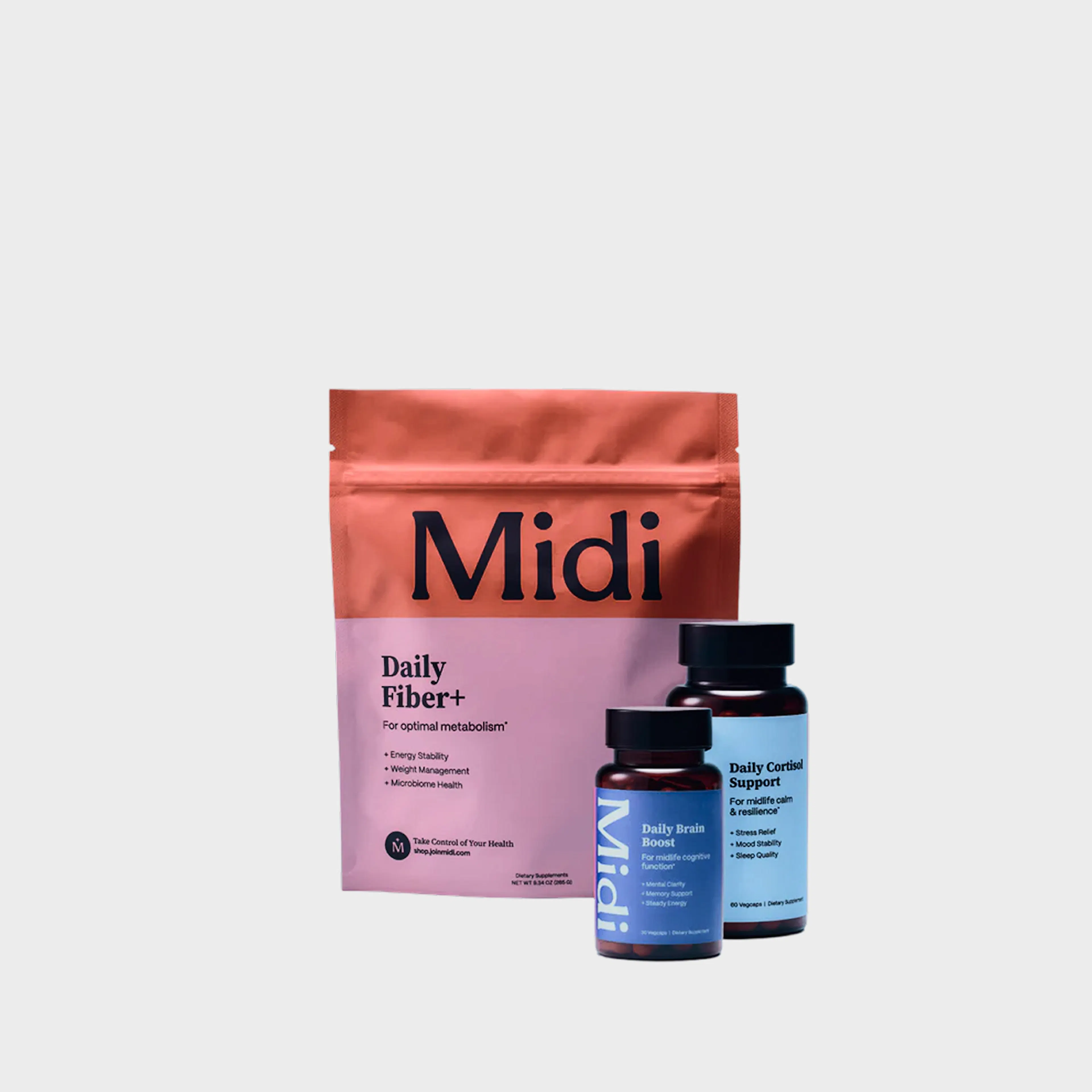 A bundle showing a bag of daily fiber+ gummies, a bottle of daily cortisol support and a bottle of daily brain boost capsules.