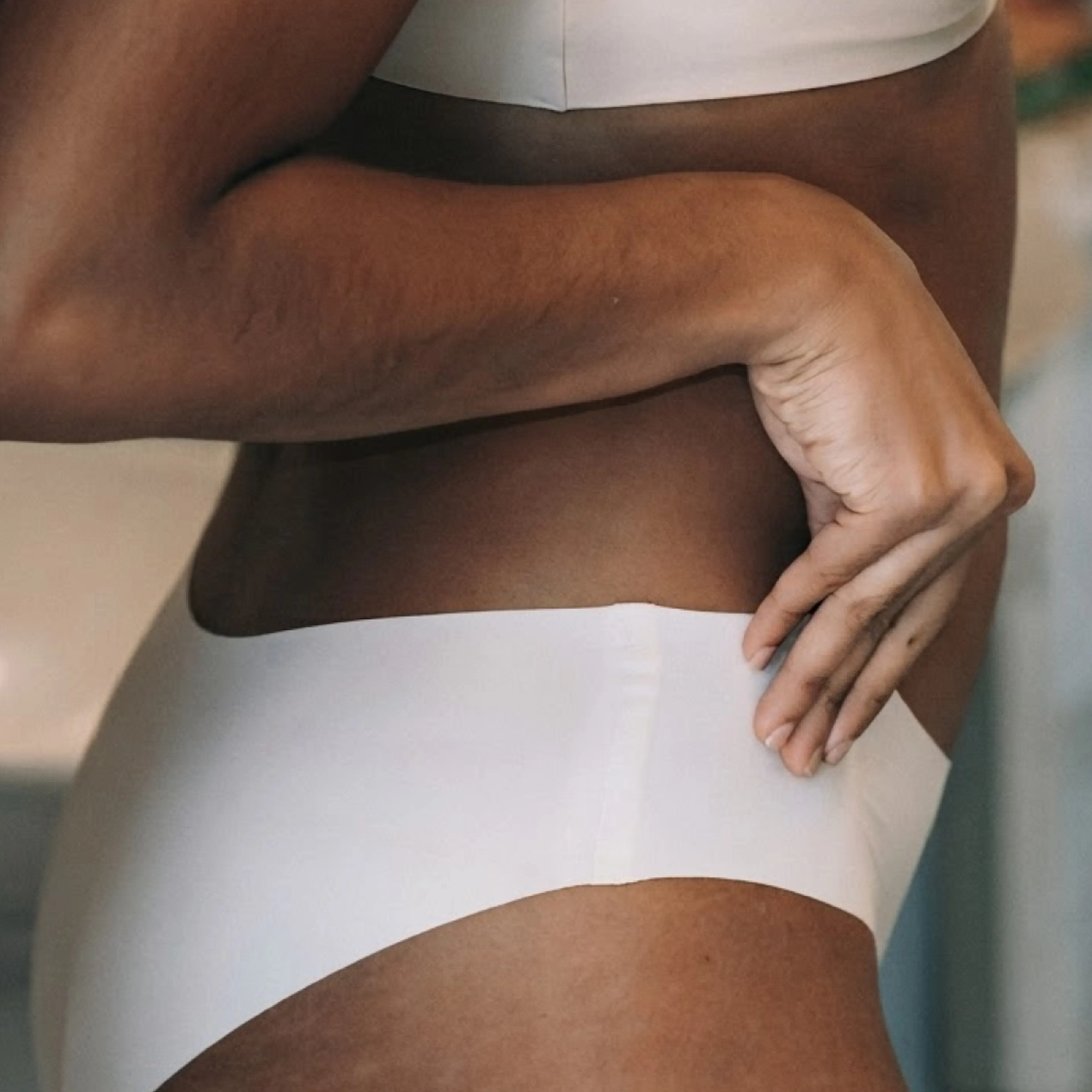 A close-up photo of a woman's midsection.