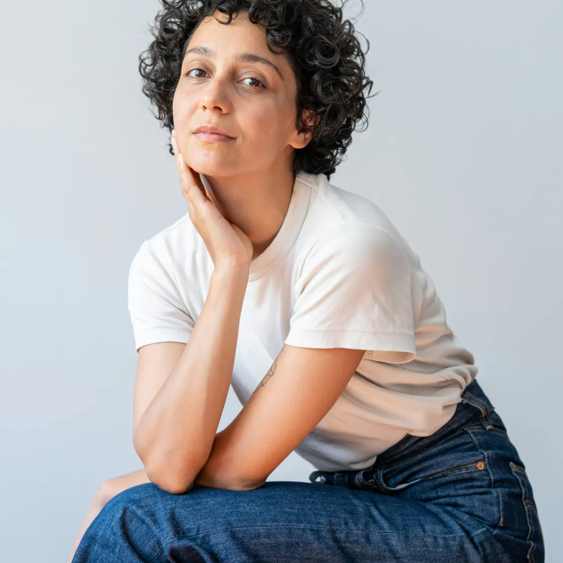A woman in menopause looking at the camera.