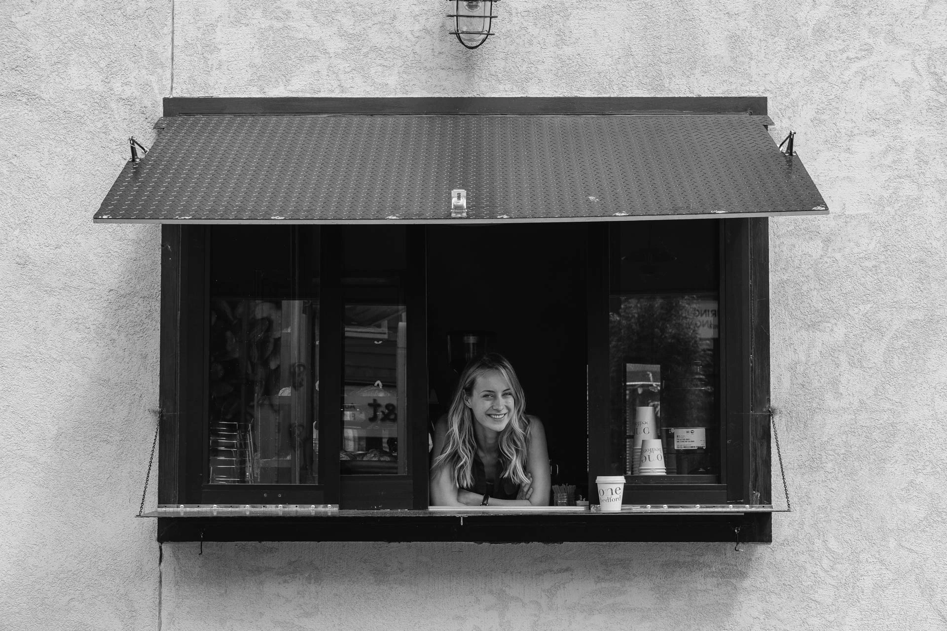 Women standing inside a coffee