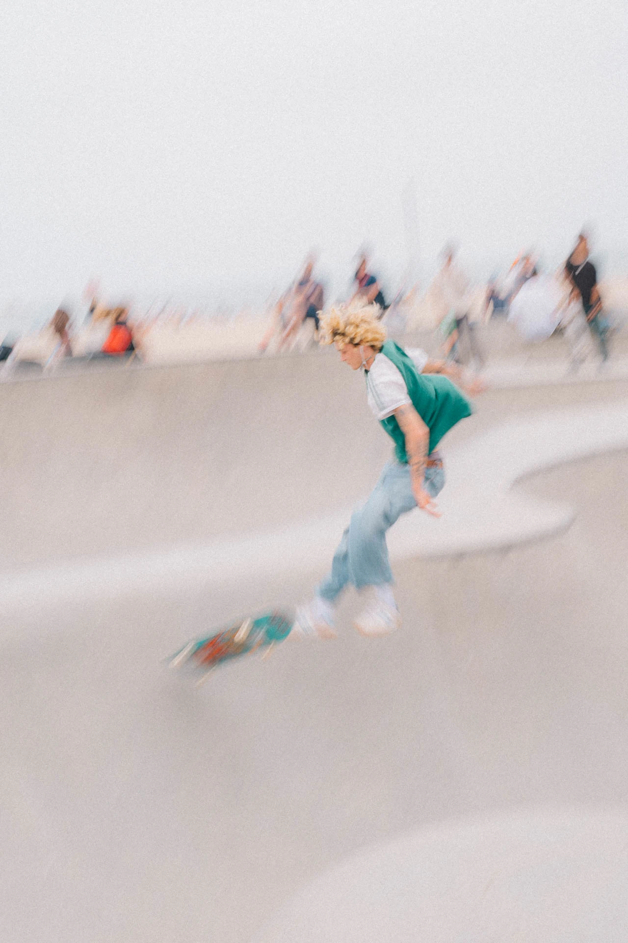 Venice Beach skateboarder in motion on a sunny day by the beach