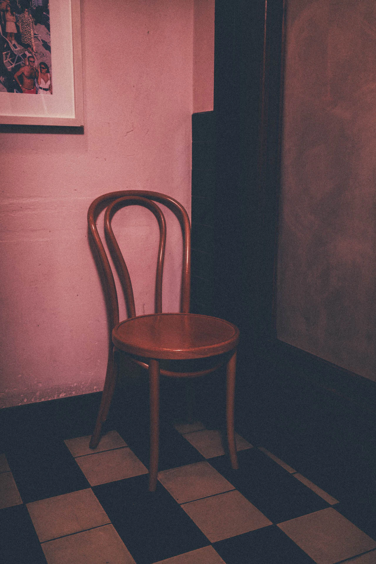 Chair in a pink bathroom. Look Honey, Another Chair from Jonathan Grado's Hold Down to Flush.