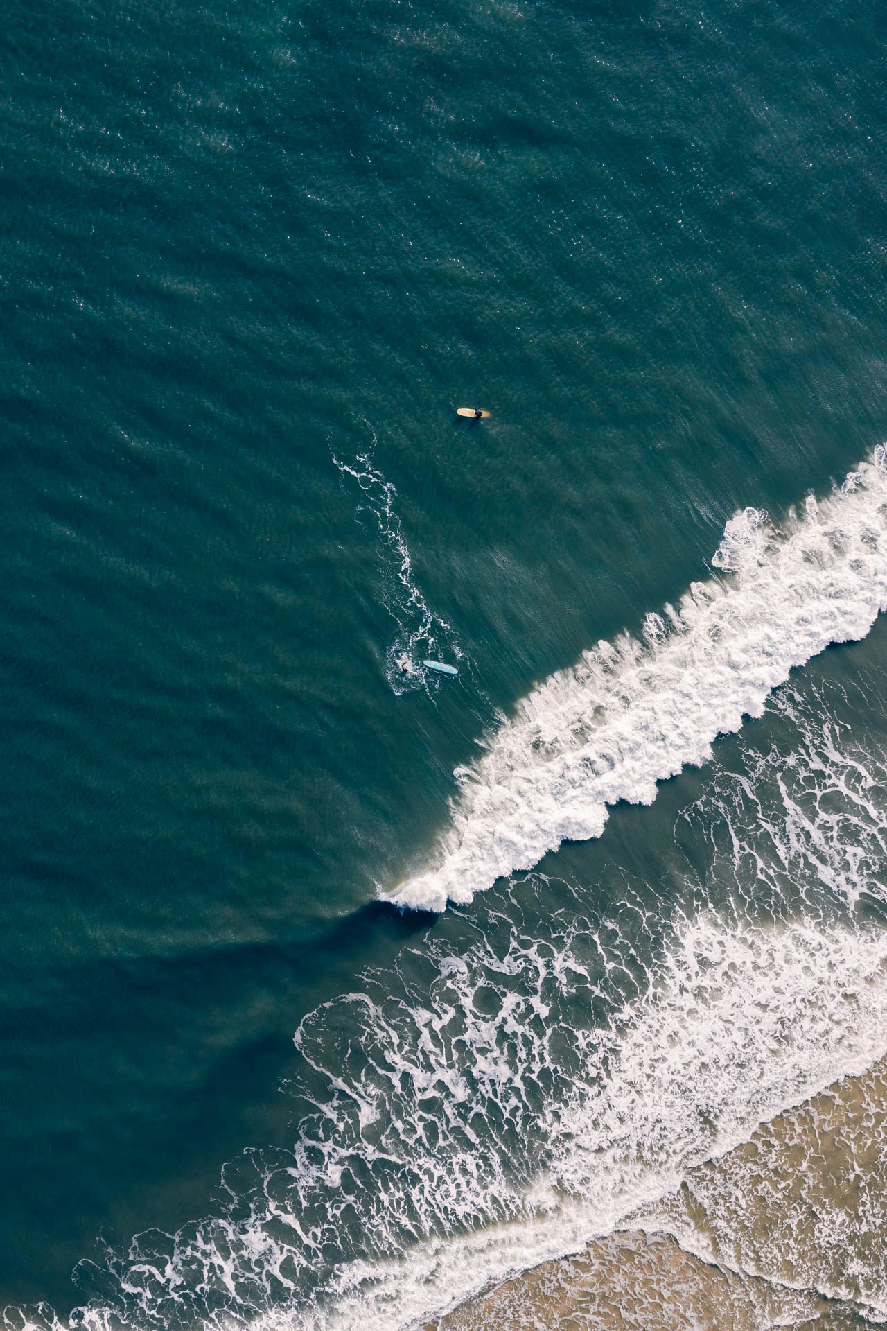 Surfers from a drone