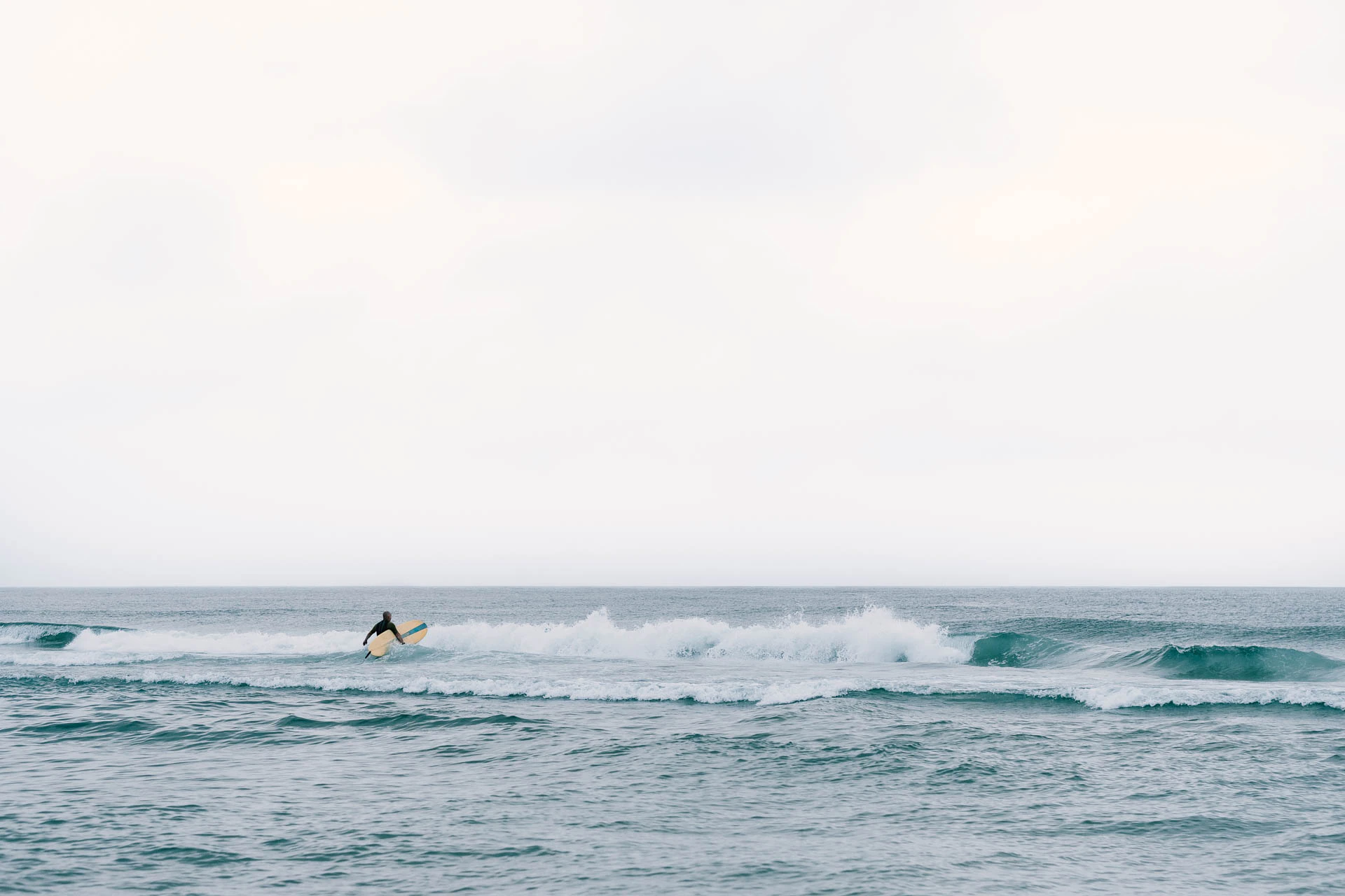 Surfer at beach haven