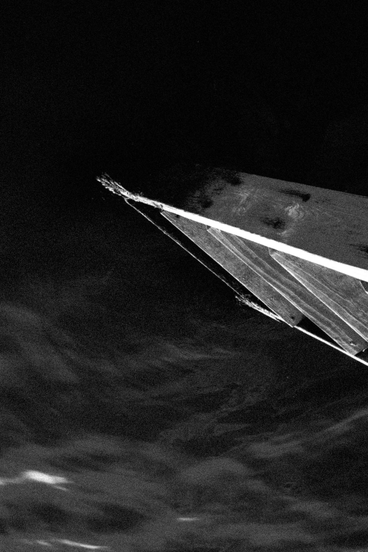 Ladder going up to a body of water in the sky. Not Worth the Climb from Jonathan Grado's Dirty Static.