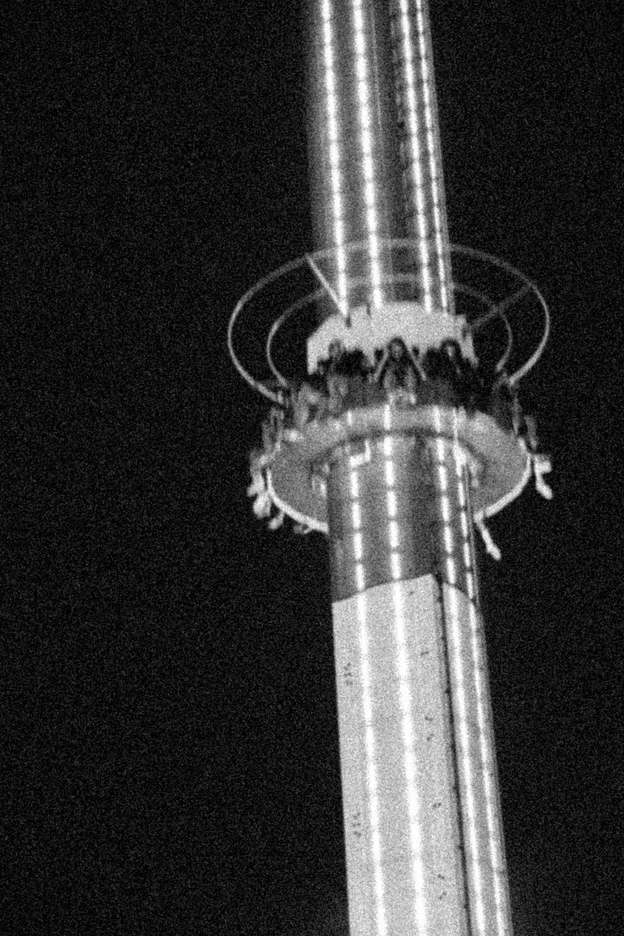 Fantasy island amusement park lighthouse ride at night with motion. Safety Key from Jonathan Grado's Dirty Static.