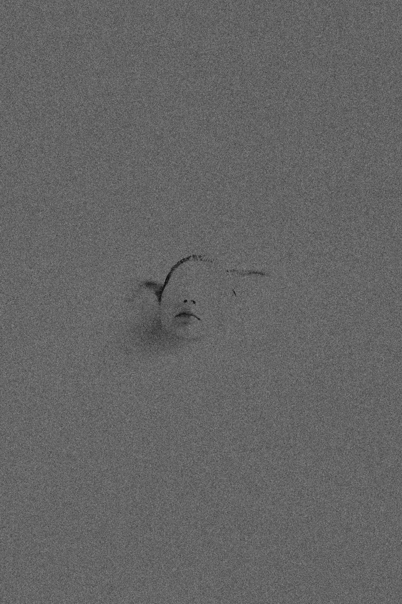 Faceless woman coming out of grainy water. Sinking, Sunk from Jonathan Grado's Dirty Static.
