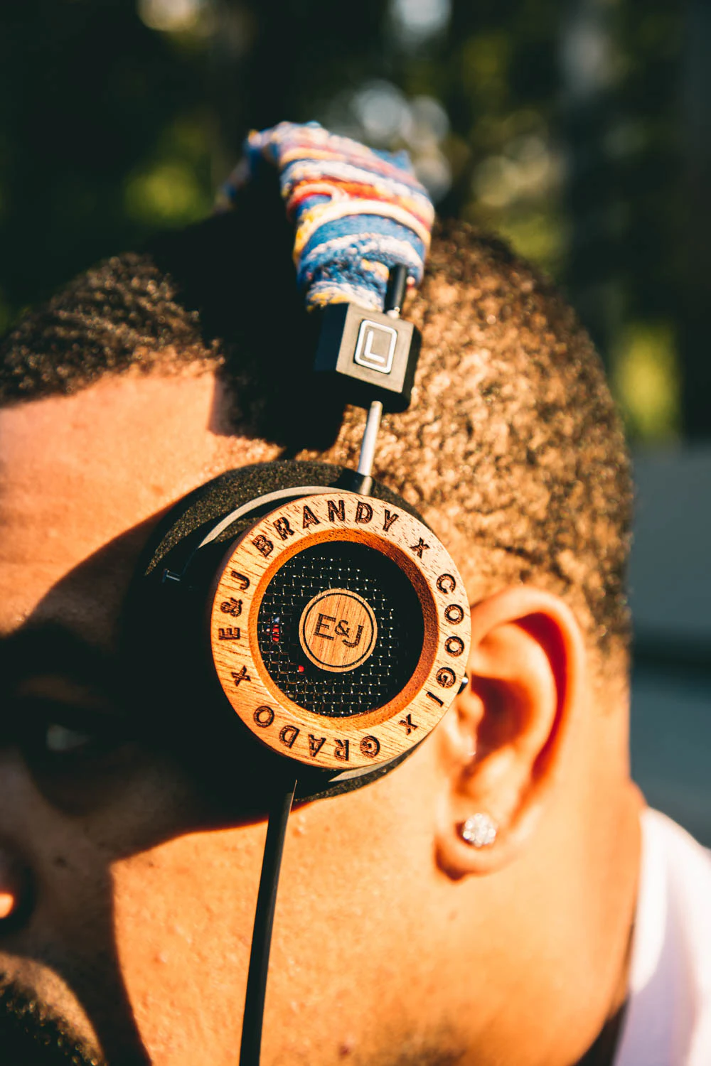 man wearing Grado Labs x Coogi x EJ headphones
