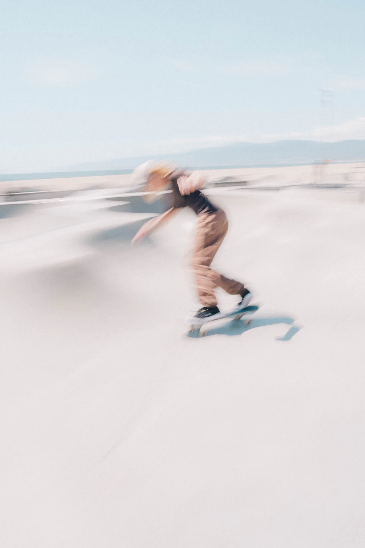 skateboarder in motion at venice beach